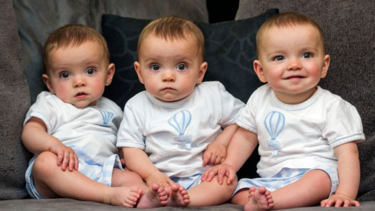 Absolutely identical triplets. They are already 7 years old: how handsome brothers grow and look