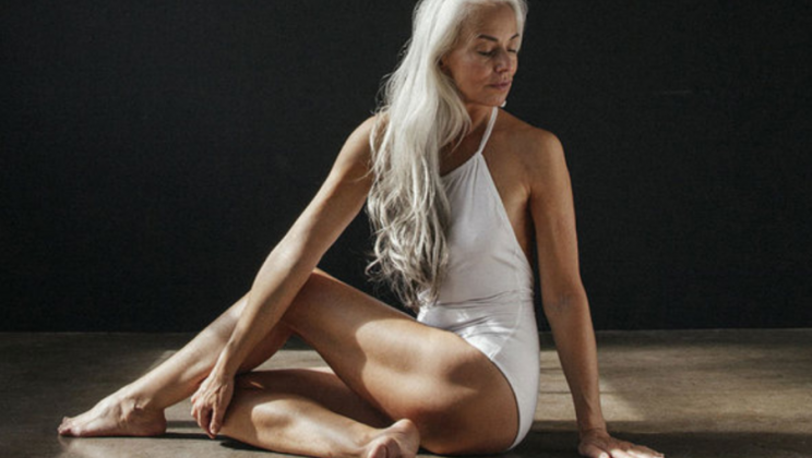 A 61-year-old grandmother looks amazing in her white swimsuit – now watch her turn around