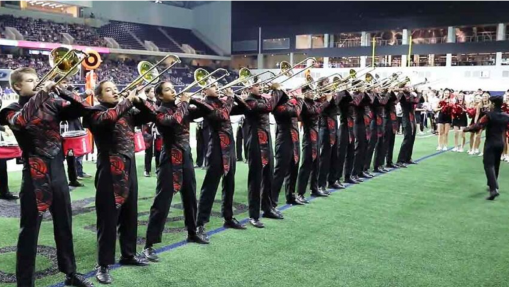 Mind blowing marching band routine involves trombones, extreme timing, and some close calls