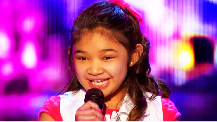 9-Year-Old Wins Golden Buzzer With Red Hot Performance of ‘Girl On Fire’