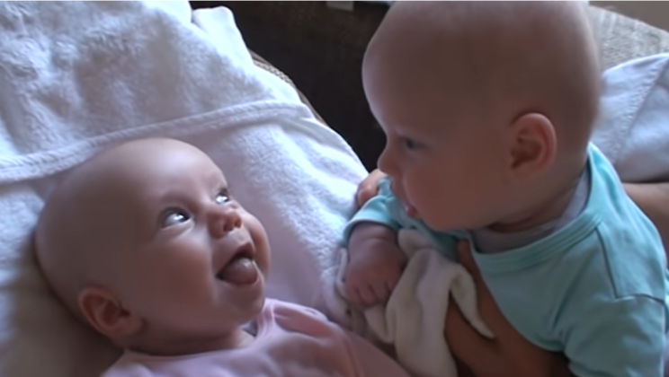 Perfect timing: dad films his twins having a beautiful conversation