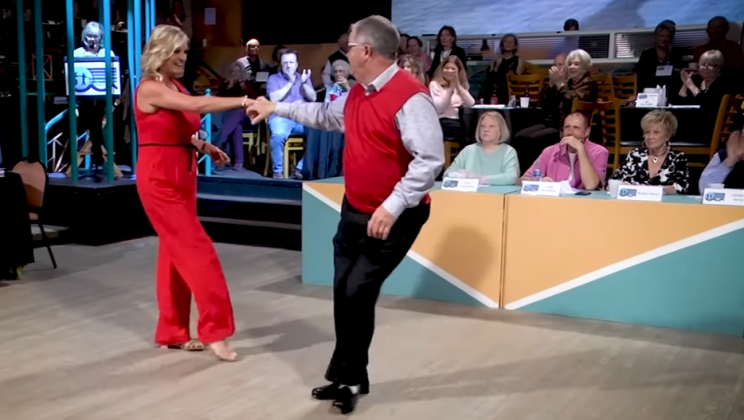 Two seniors take the dance floor and cut up a rug when their legs begin moving