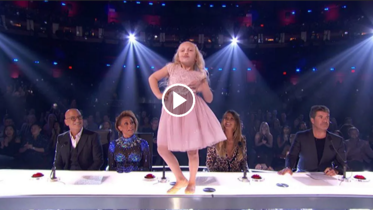 A boy and a girl enter the dance floor under Footloose, circling the judges’ heads