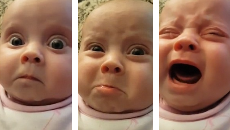 Dad sings “Somewhere Over The Rainbow” to his baby daughter and her reaction is priceless