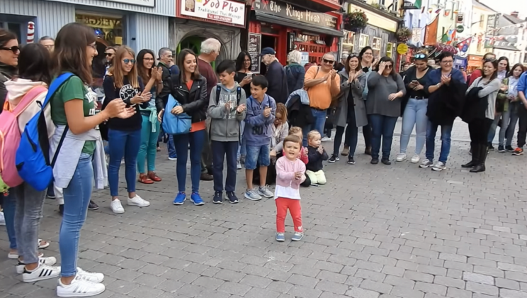 Emma O’Sullivan And A Small Girl Dance Together