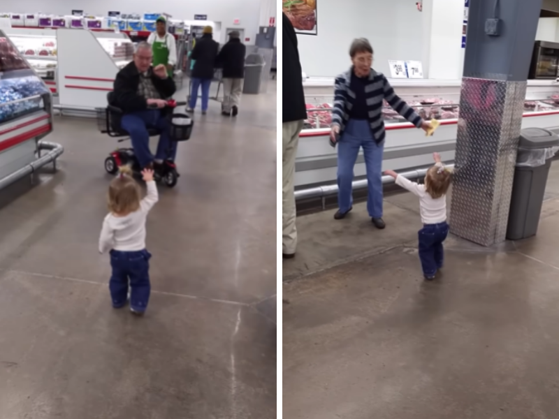 Little Baby Girl Spreading Joy by Waving to Shoppers