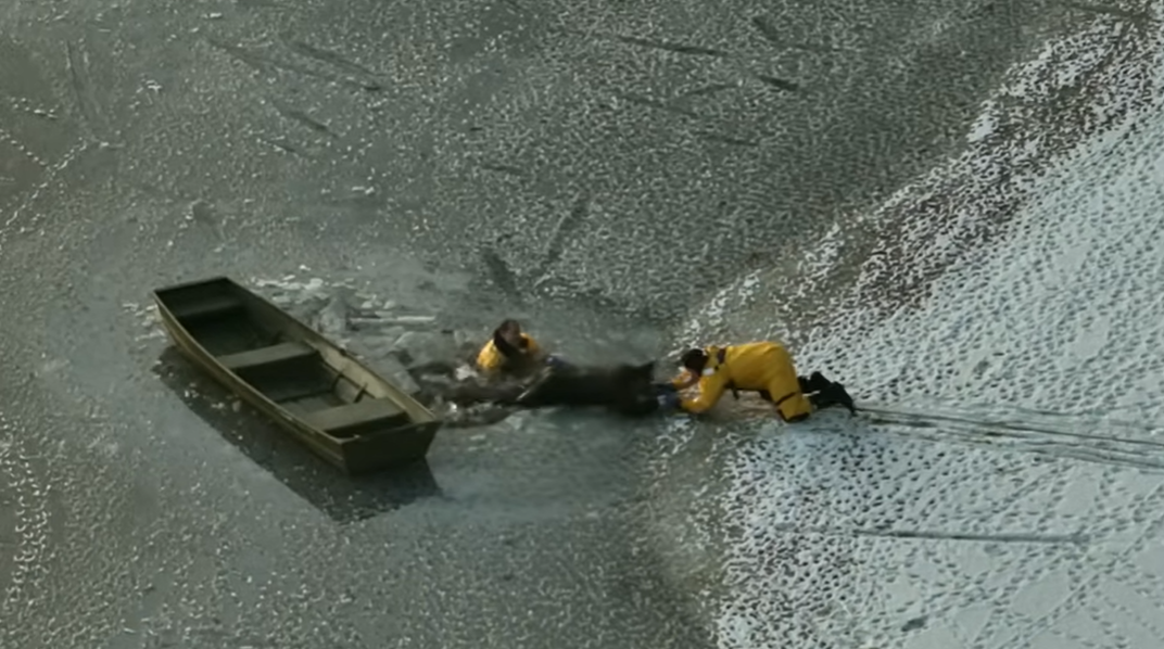 Dramatic Ice Rescue Of A Man And His Dog After Both Fell Into A Frozen Lake