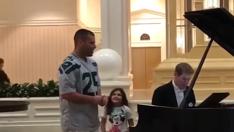 Man Stuns Crowd with ‘Ave Maria’ at Disney Resort While His Daughter Watches Proudly